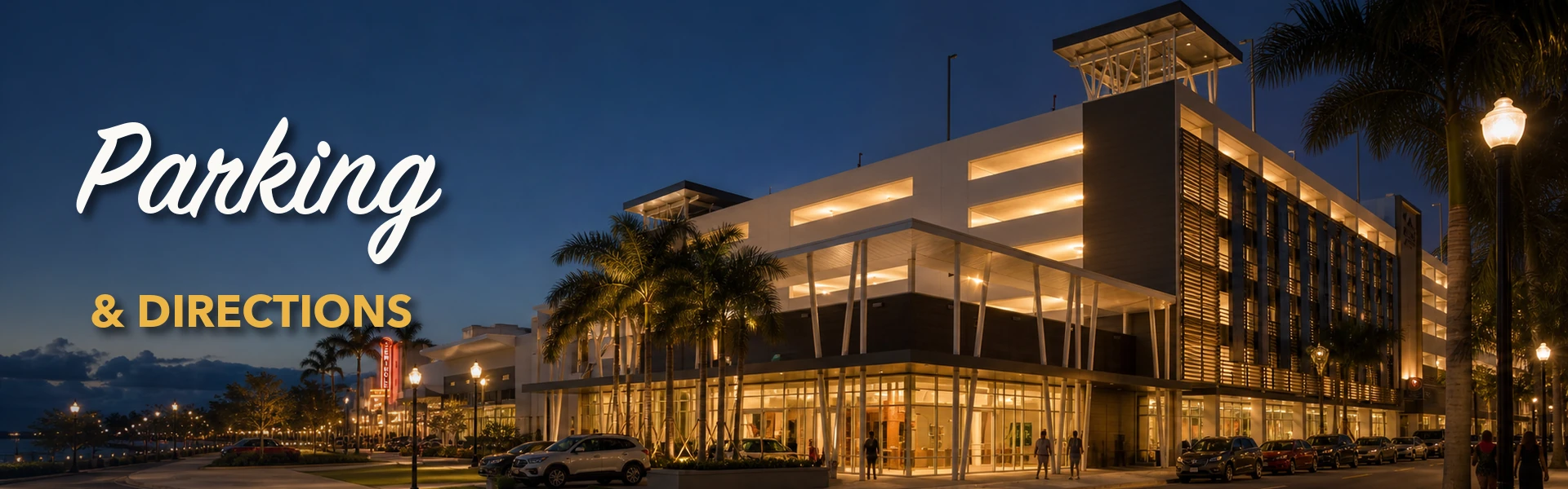 Homestead Station parking garage illuminated near Seminole Theatre in Downtown Homestead.